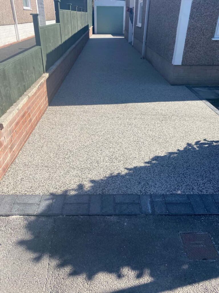 This is a photo of a resin path installed in Leeds by Leeds Resin Driveways