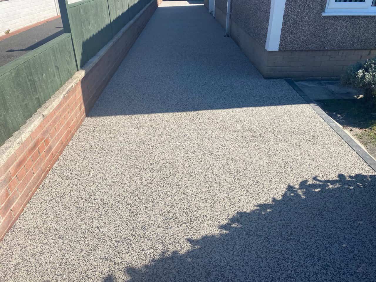 This is a photo of a resin path installed in Leeds by Leeds Resin Driveways